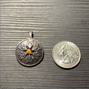 Silver pendant with tigers eye